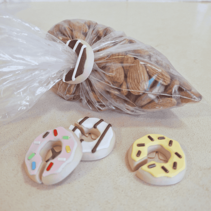 Cute donut bag clips with magnets for fridge storage.