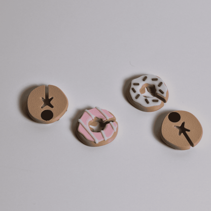 Colorful magnetic chip clips shaped like donuts