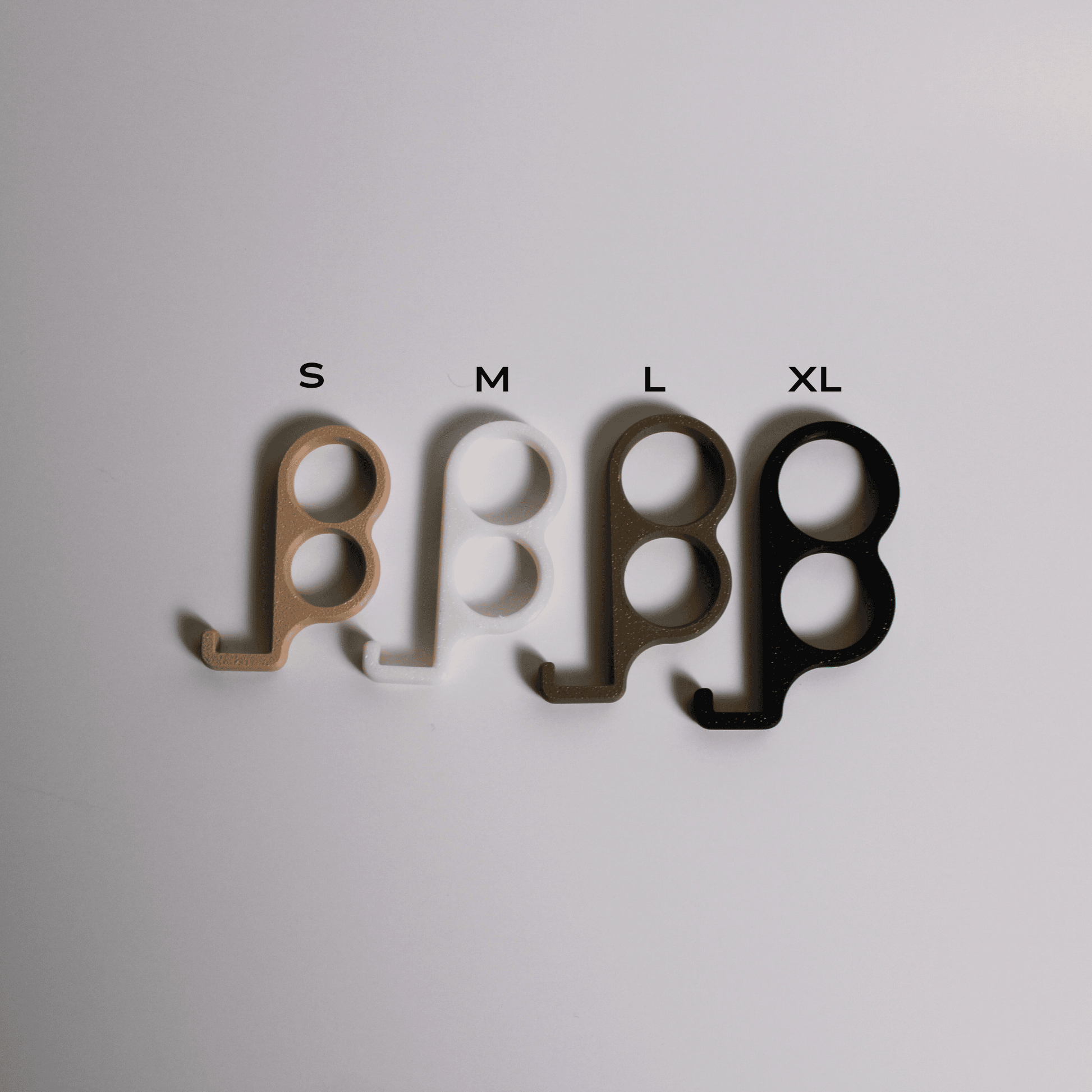 Four size markers labeled S, M, L, and XL on a light gray background.